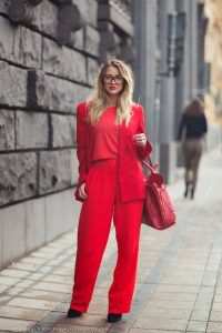 Lady dressed in bright red colour
