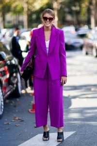 Lady in violet outfit
