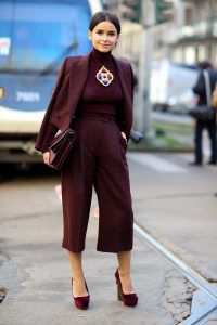 Mira Duma in burgundy outfit