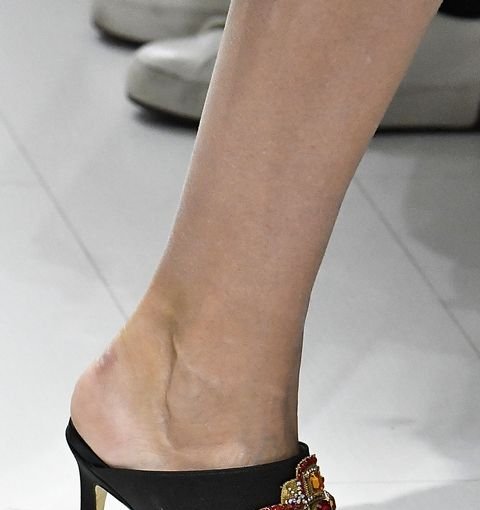 Versace shoes presented during Milan Fashion Week.