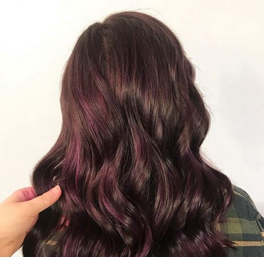 If you're heaind soon to the hair salon, you might want to try the treniest hair color of 2019, which comes in the shade of aubergine.