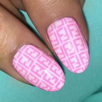 On the verge of kitsch or proof of exquisite taste a nail art with a luxury brand logo is the latest trend in nails. Love it hate it, they're here and we offer few ideas.